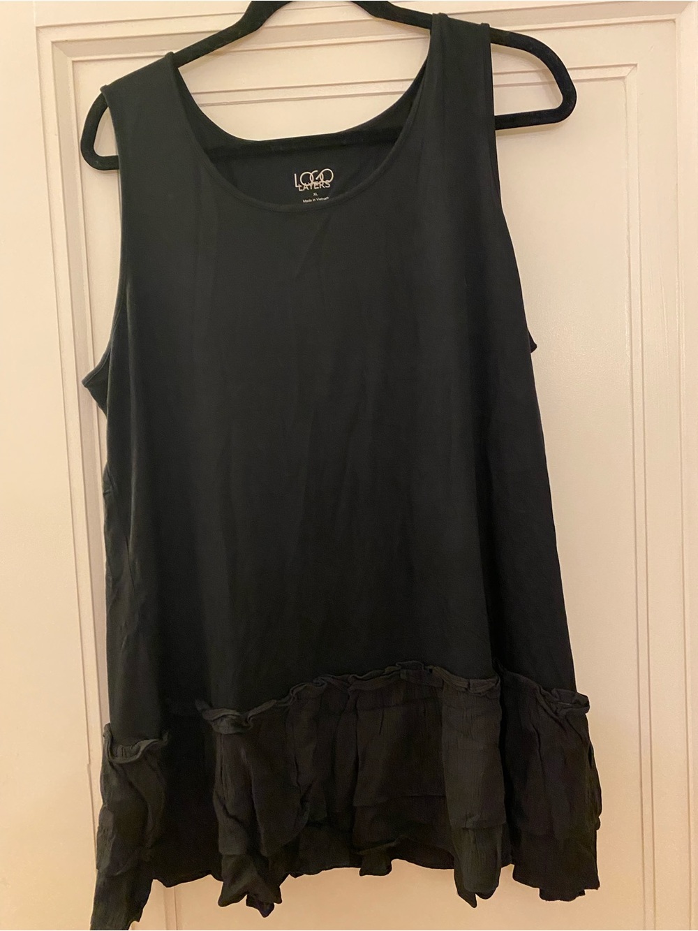 NWOT logo layers black tank top with ruffle bottom. Size xl
